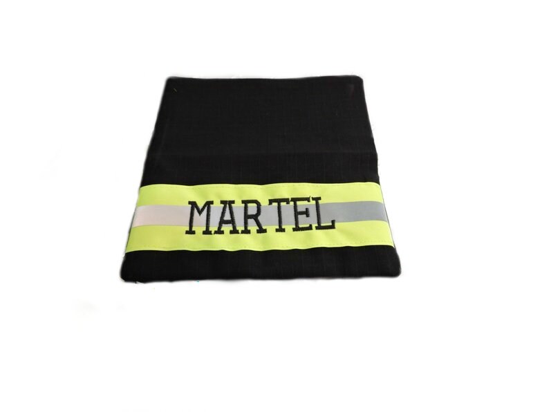 Black fabric and neon yellow reflective tape. Firefighter Checkbook cover with a name embroidered on the front of the cover.