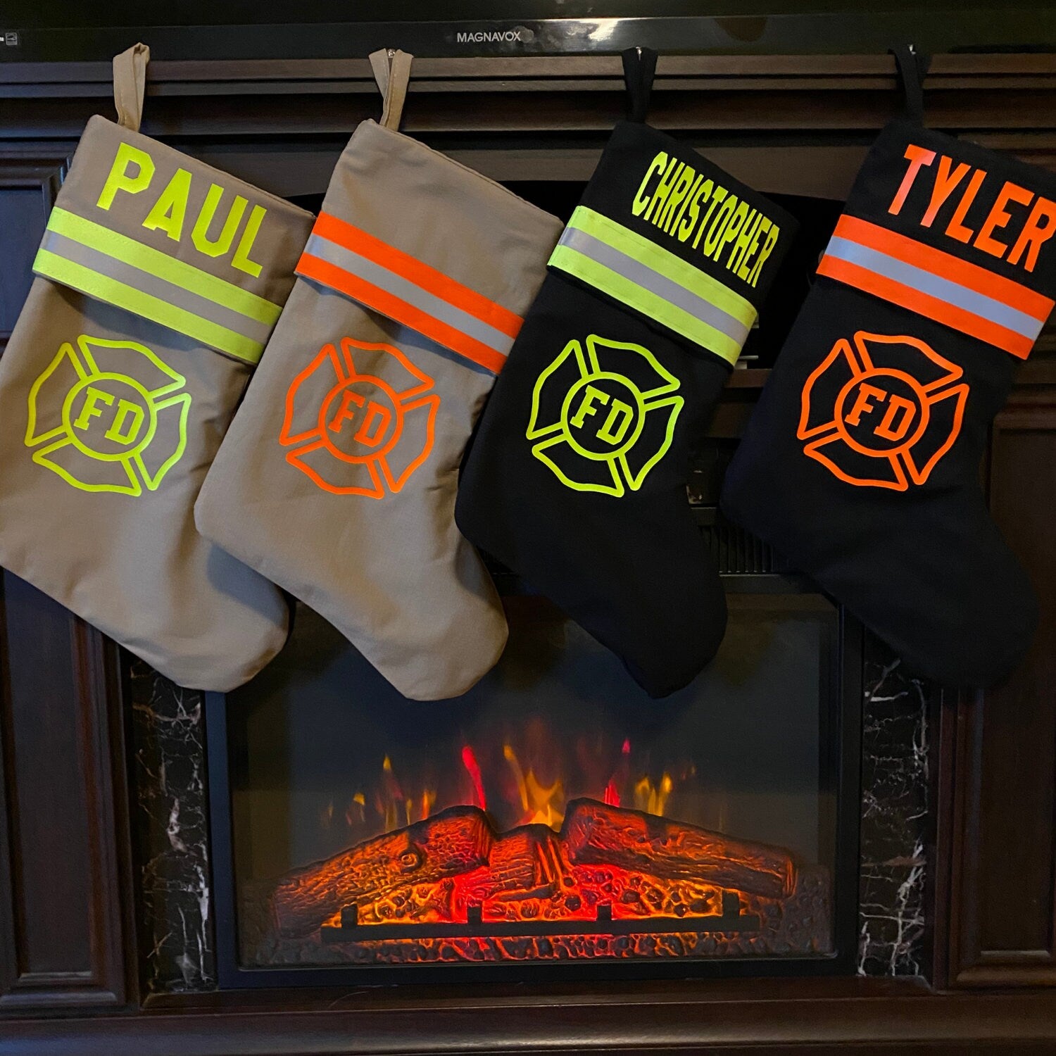 all the styles of Firefighter Christmas stocking with maltese cross stockings hanging from a fireplace