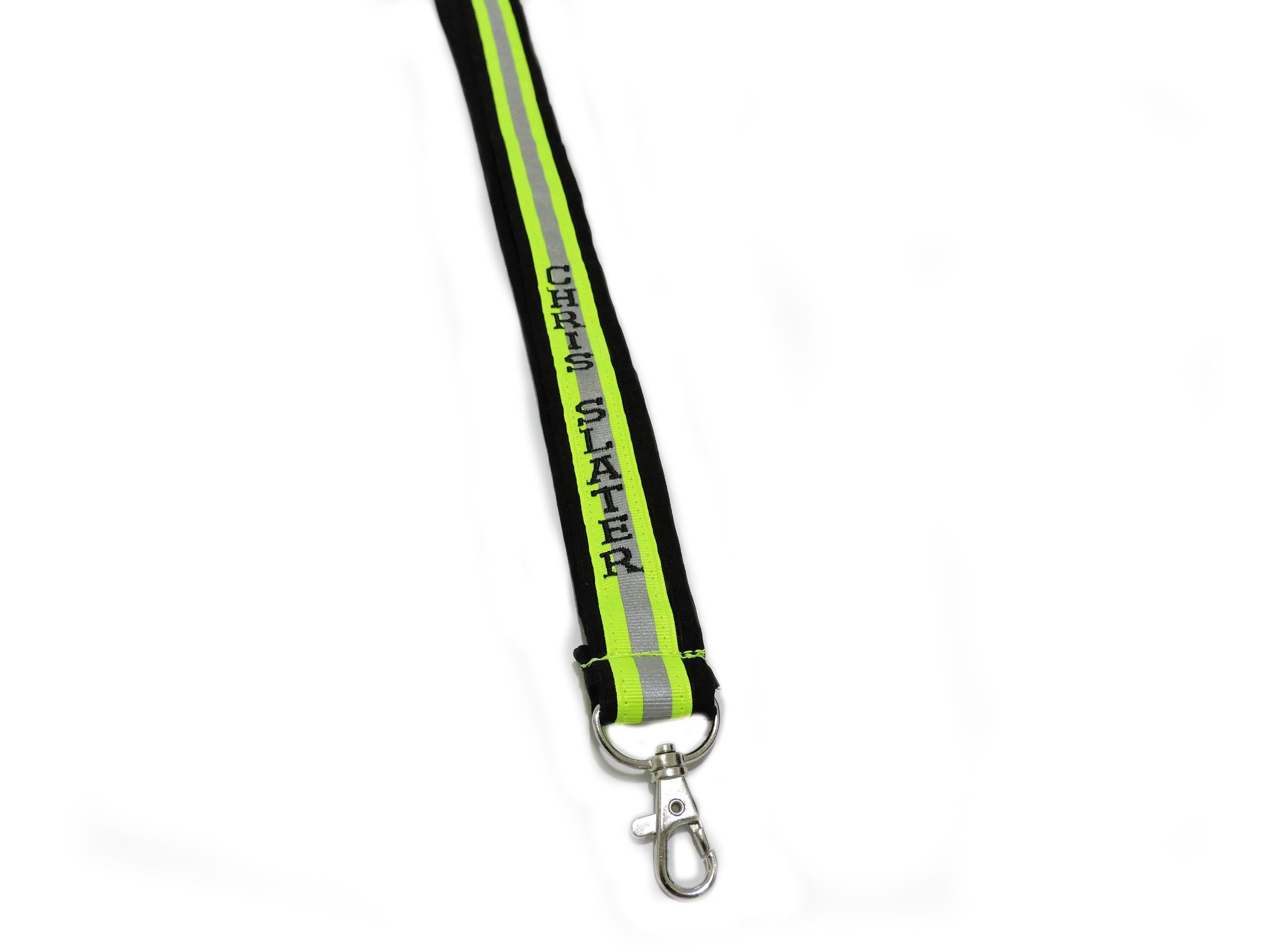 black fabric with neon yellow reflective tape with a name added firefighter lanyard