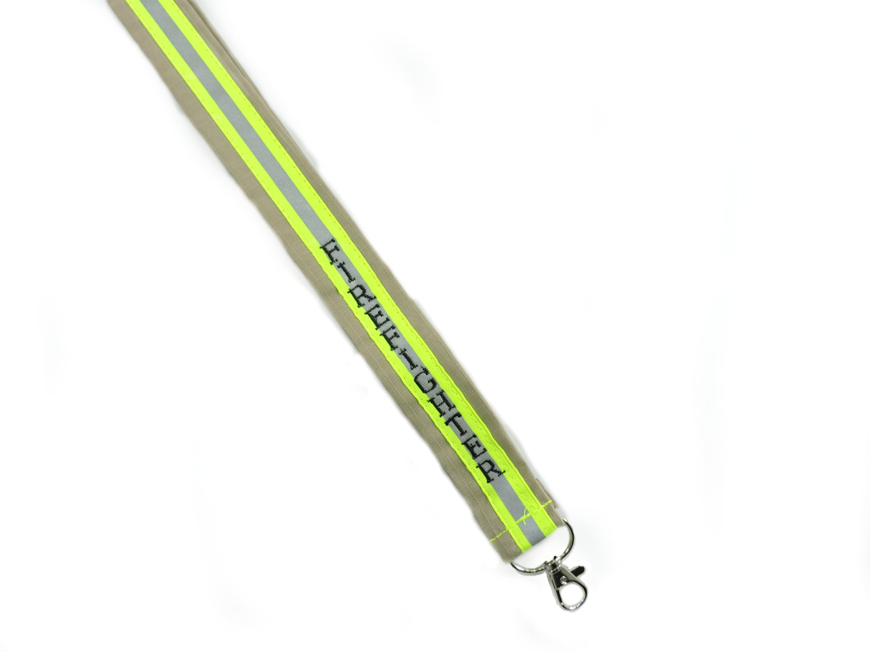 Tan fabric with neon yellow reflective tape with a name added firefighter lanyard