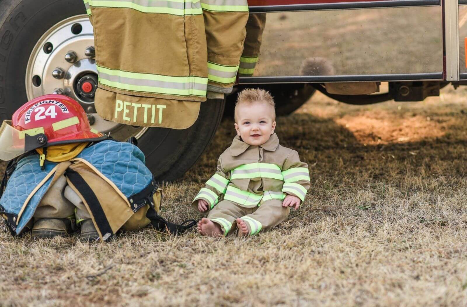 Baby Wearing a turnout gear specially sized for him