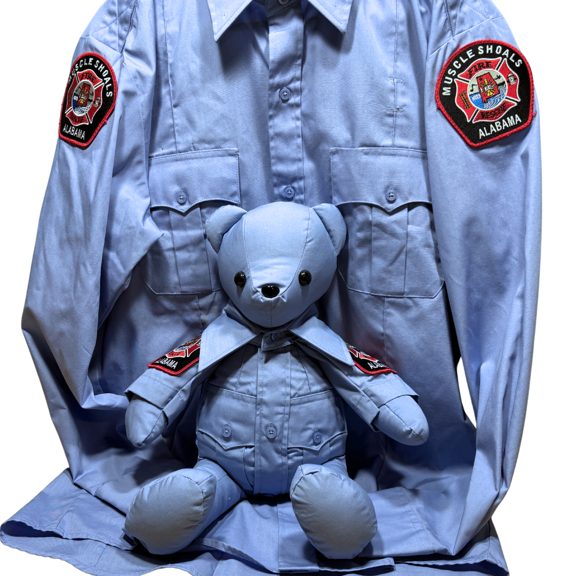 Firefighter memory bear in front of a firefighter class a shirt 