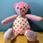 Memory Bear Made out of your loved ones clothing  this memory bear was made from a set of girls baby clothing and has a name and date added to the bears paws.  