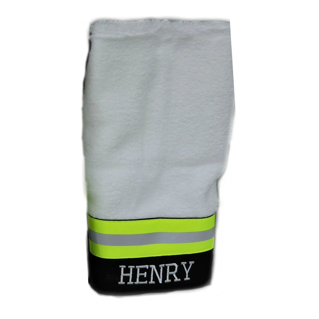 black fabric with neon yellow reflective tape  with name Firefighter Bath Hand Towel
