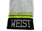 black fabric with neon yellow reflective tape firefighter bath towel with a name added
