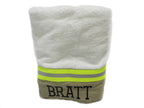 Tan fabric with neon yellow reflective tape  firefighter bath towel with a name added 
