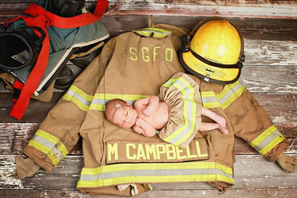 baby wearing firefighter baby or toddler skirt