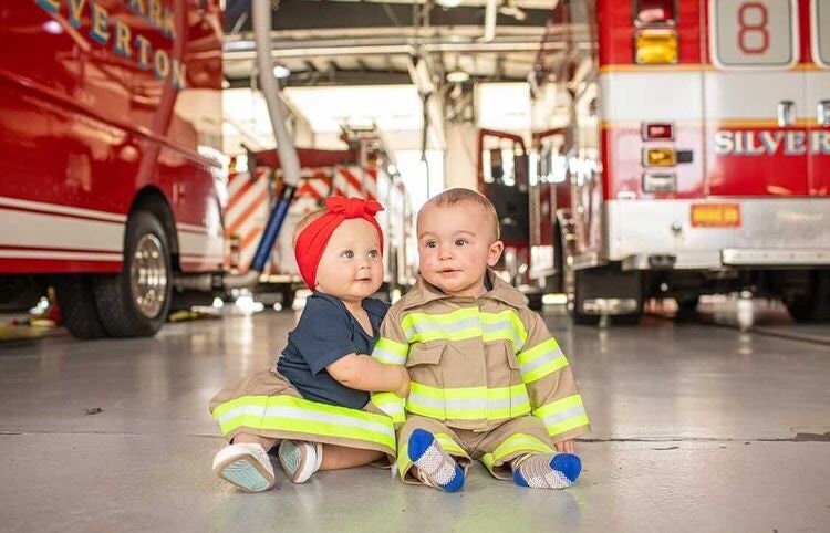 baby wearing Firefighter Baby Jacket and firefighter baby outfits